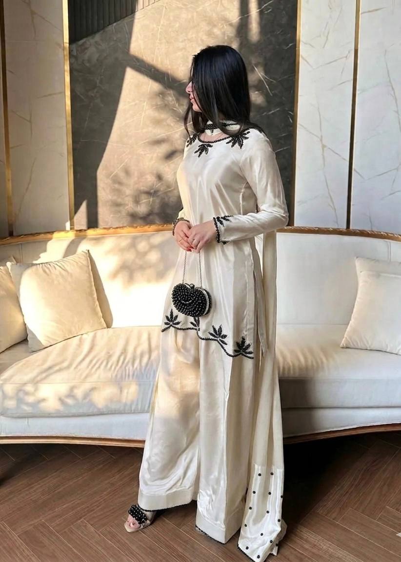Ritika Shahi Brown Color Noor Farshi Suit