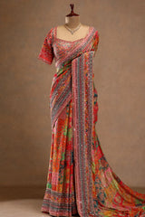 Colorful saree with intricate patterns on a mannequin against a brown background