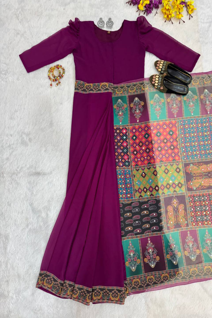 Purple saree with a colorful patterned border on a light gray background