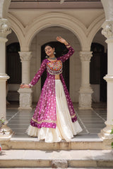 Woman in a traditional outfit standing in an architectural setting